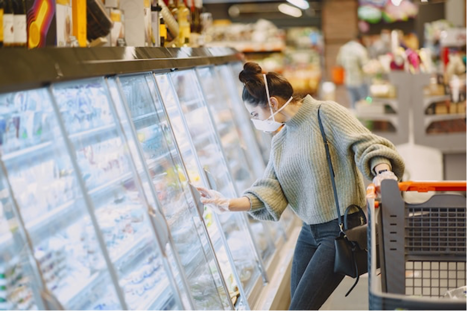 women buying frozen food in a mall