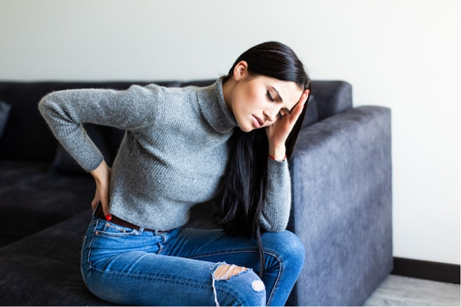 Female suffering from chronic pain