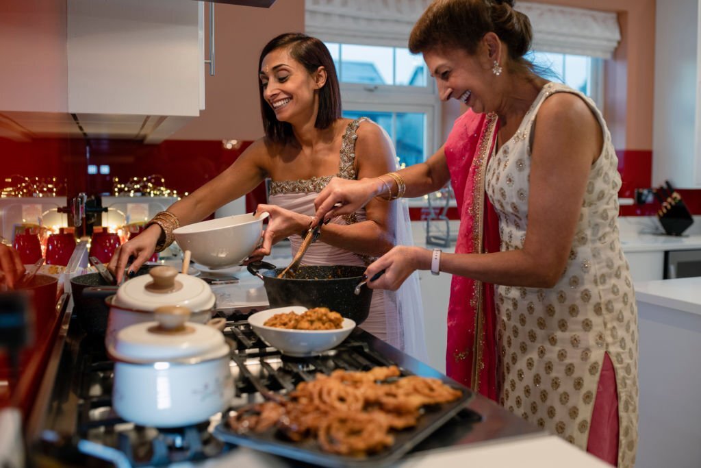 Traditional women preparing frozen snacks